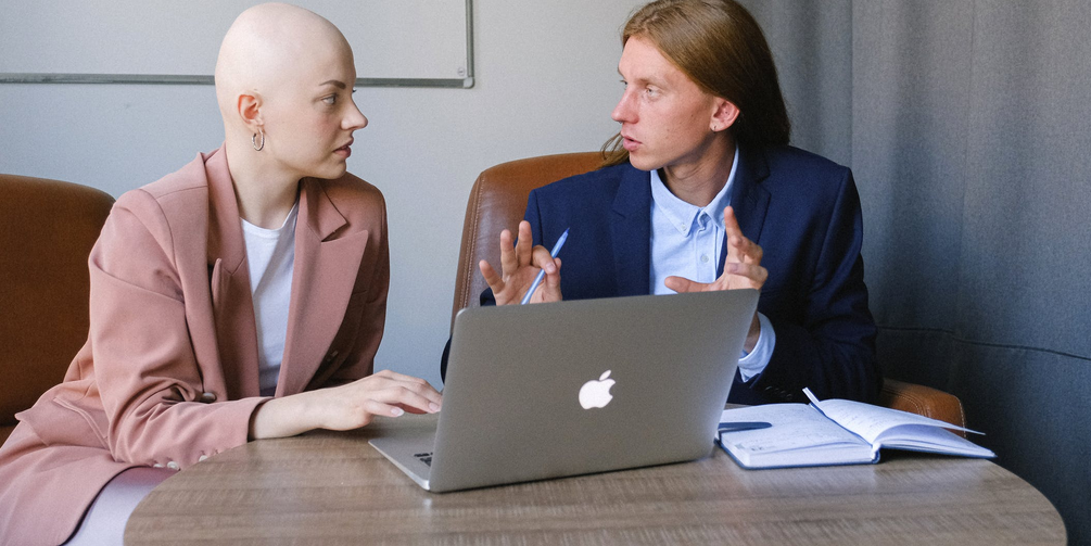 man and woman talking